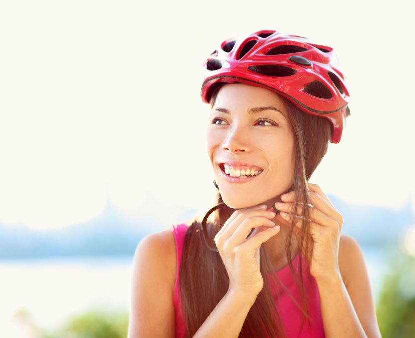 Woman Fastening Helmet - Two Forks Guide Service Person Fastening Helmet